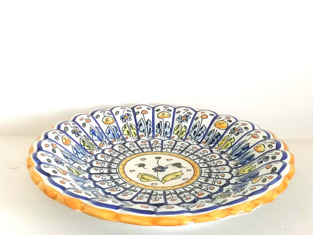 Godronné dish in earthenware signed 1951