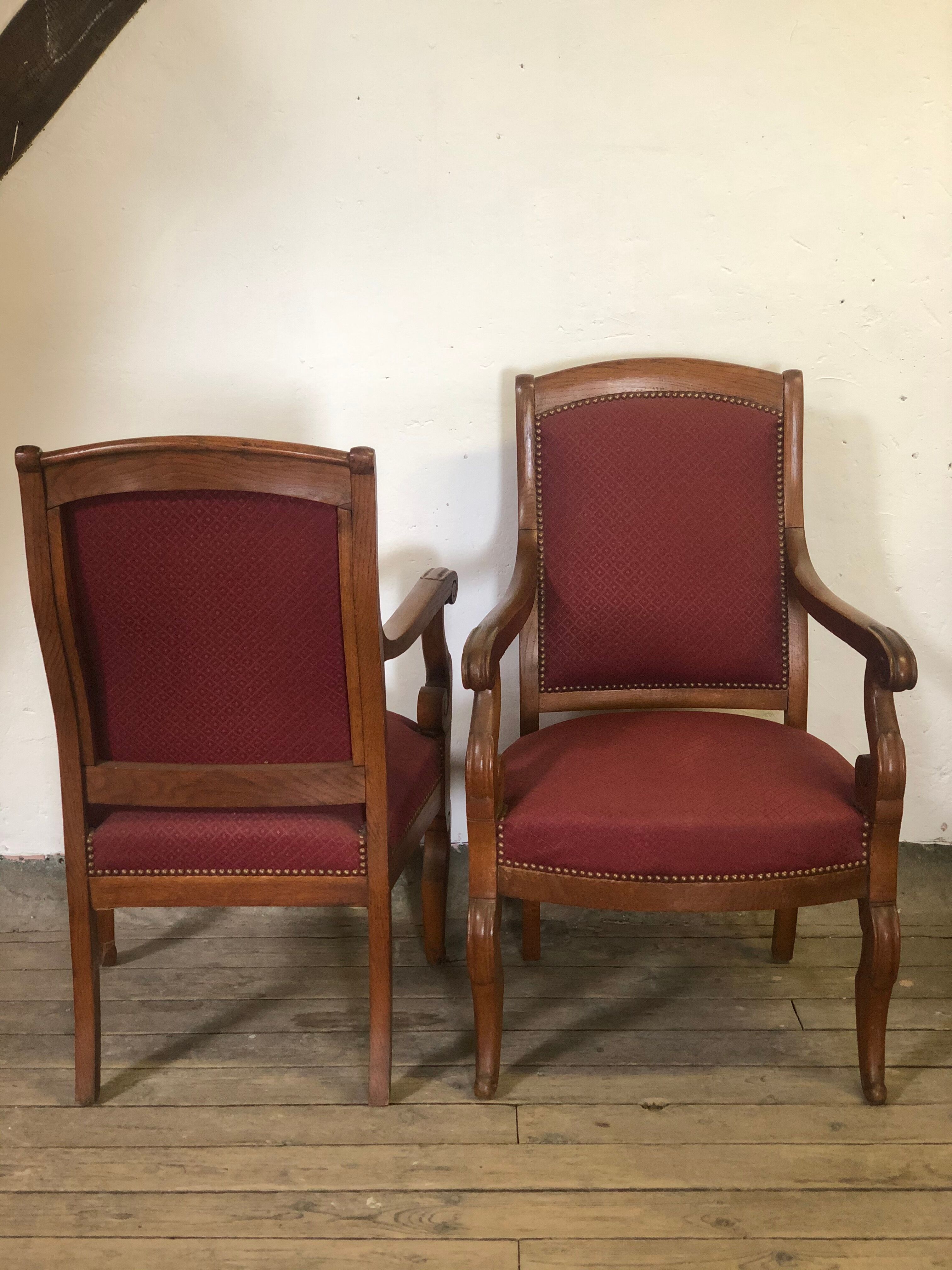 Louis Philippe era armchairs in burgundy-lined ground oak