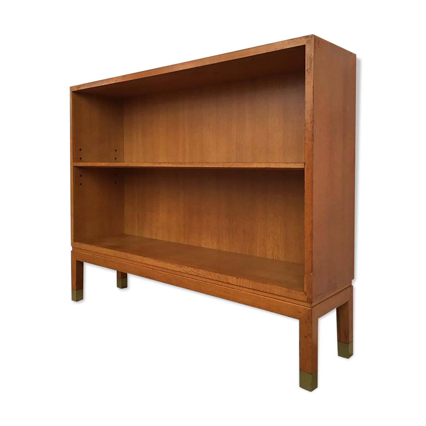Oak bookcase with brass clogs, 60's