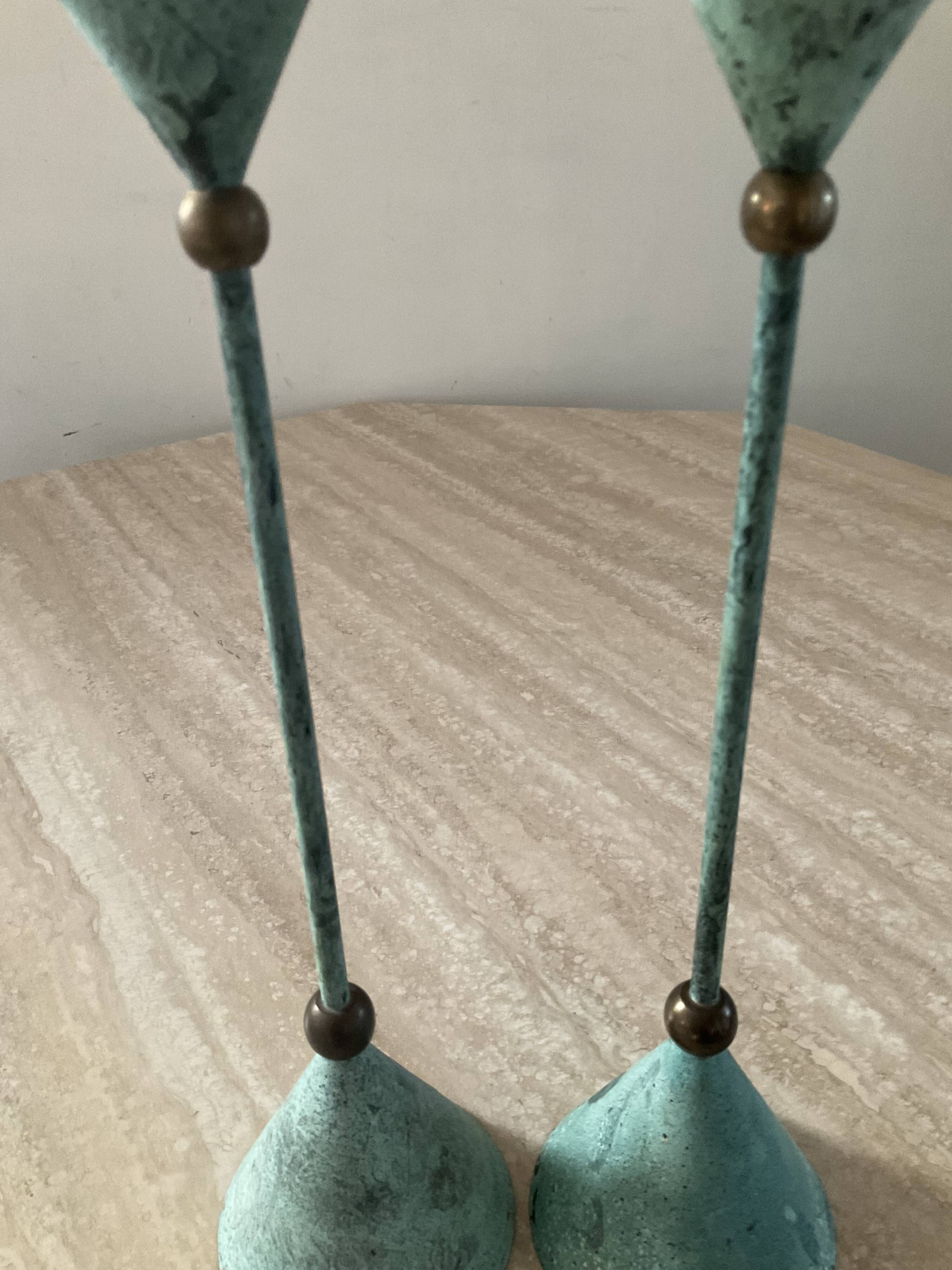 Pair of vintage brass and metal candlesticks