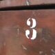 Vintage Drawer Cabinet with Dark Patina and Stenciled Letters