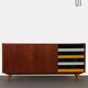 Oak sirdeboard with yellow and black drawers by Jiri Jiroutek, 1960