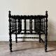 Napoleon III magazine rack in black turned wood