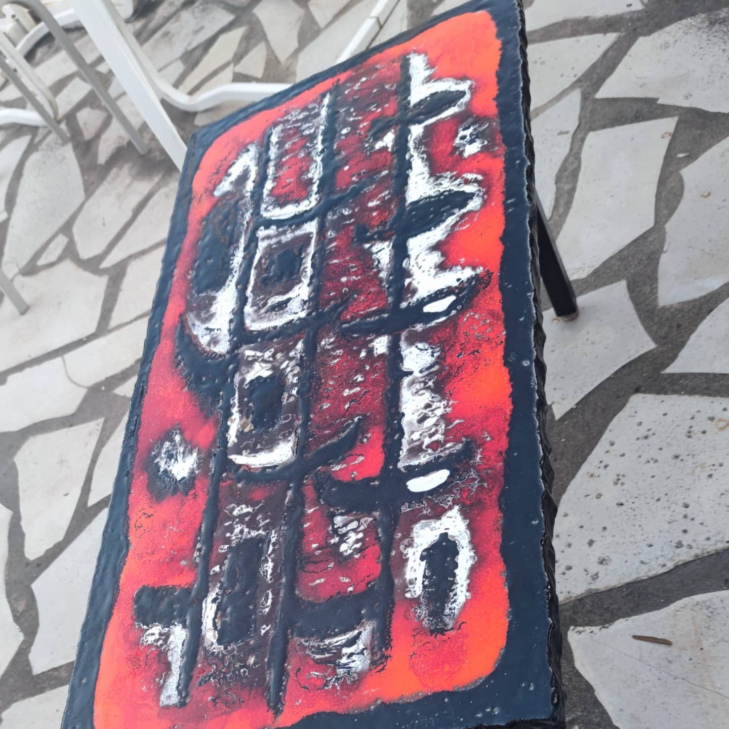 Ceramic coffee table on a lava stone slab, circa 1950