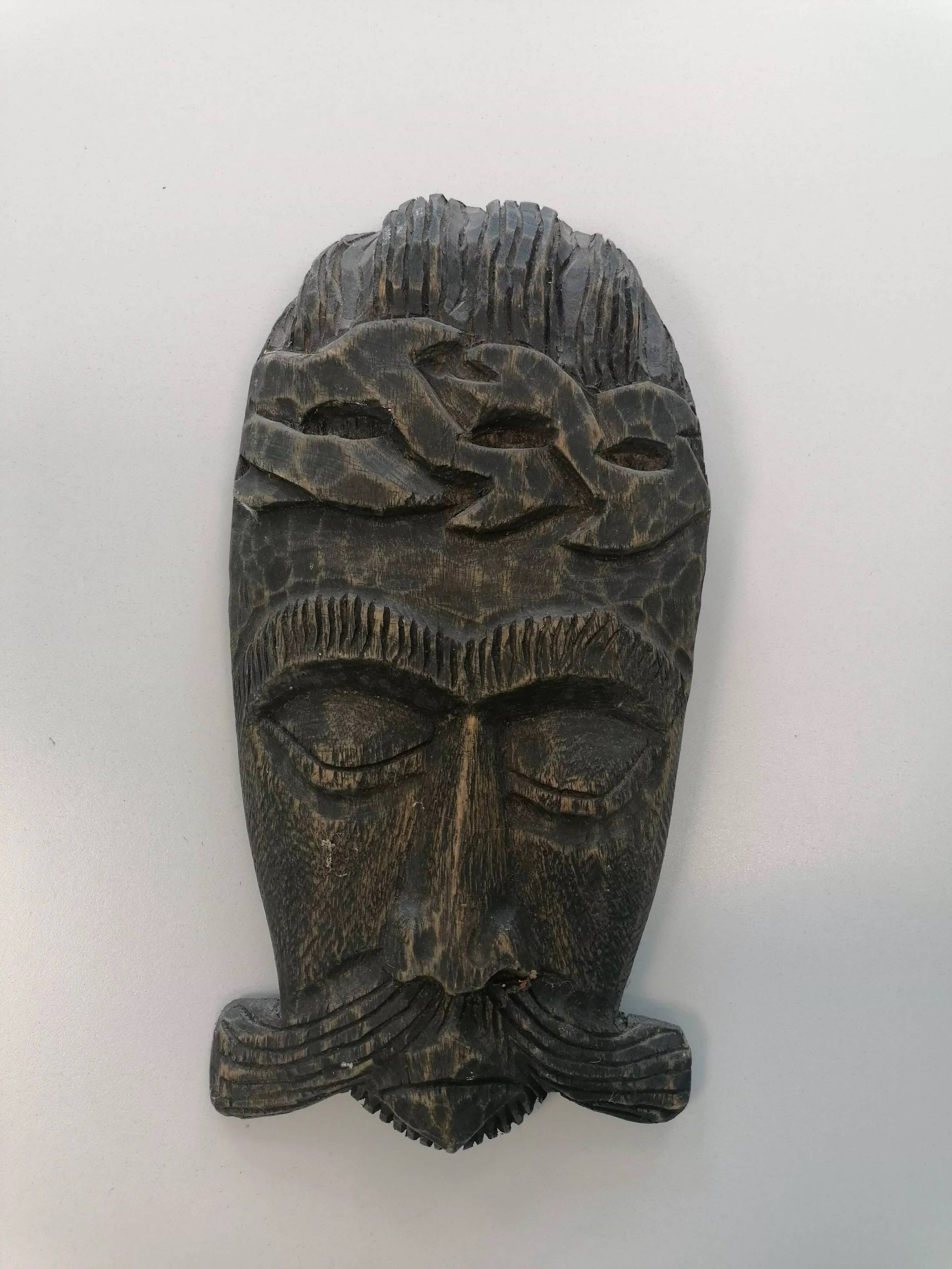 African tribal mask in carved wood - decorative ethnic art