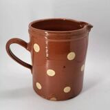 Old pitcher with polka dots savoyard pottery in glazed terracotta alsace