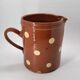 Old pitcher with polka dots savoyard pottery in glazed terracotta alsace