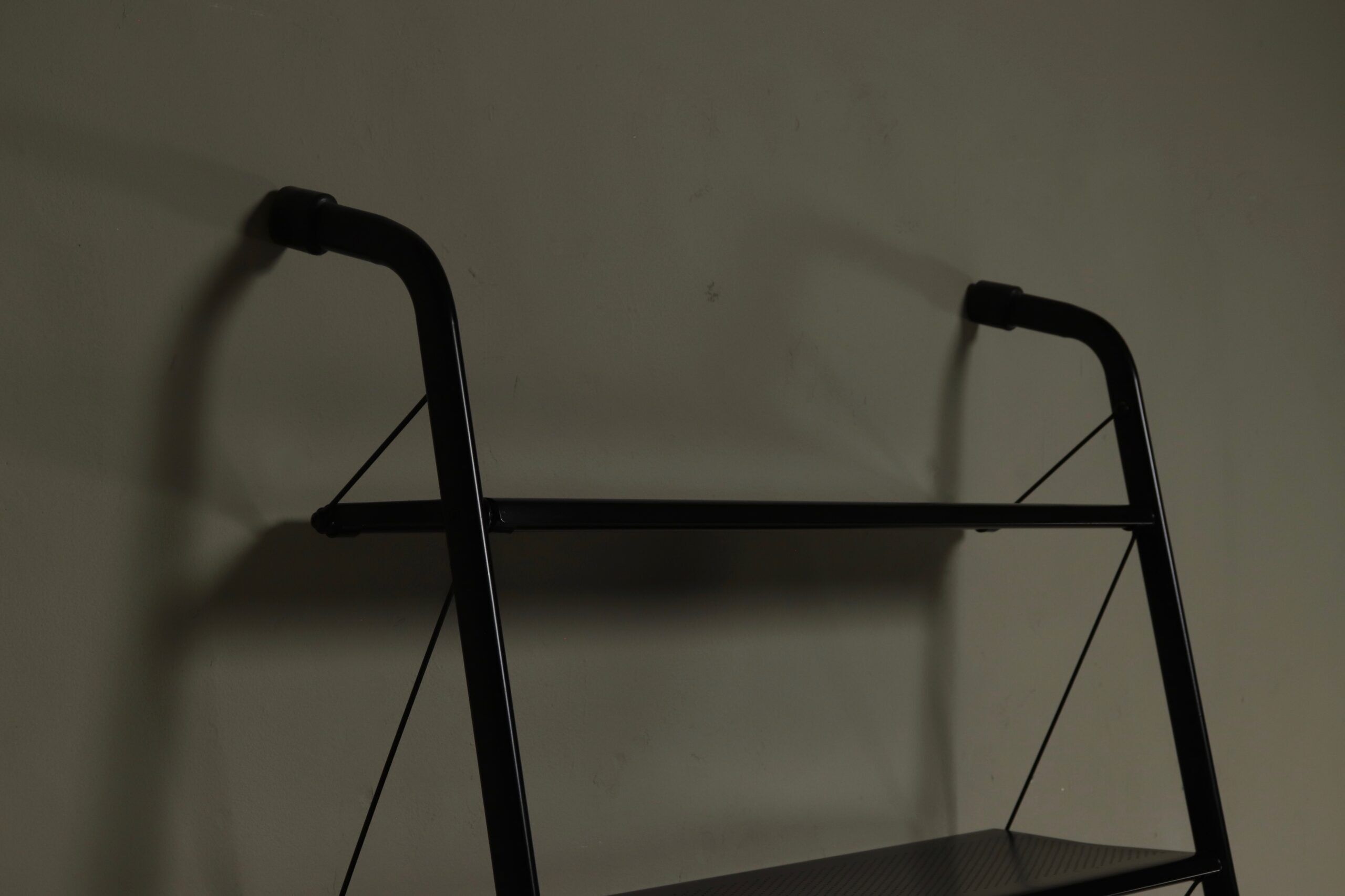 Postmodern freestanding perforated steel shelving unit 1980s