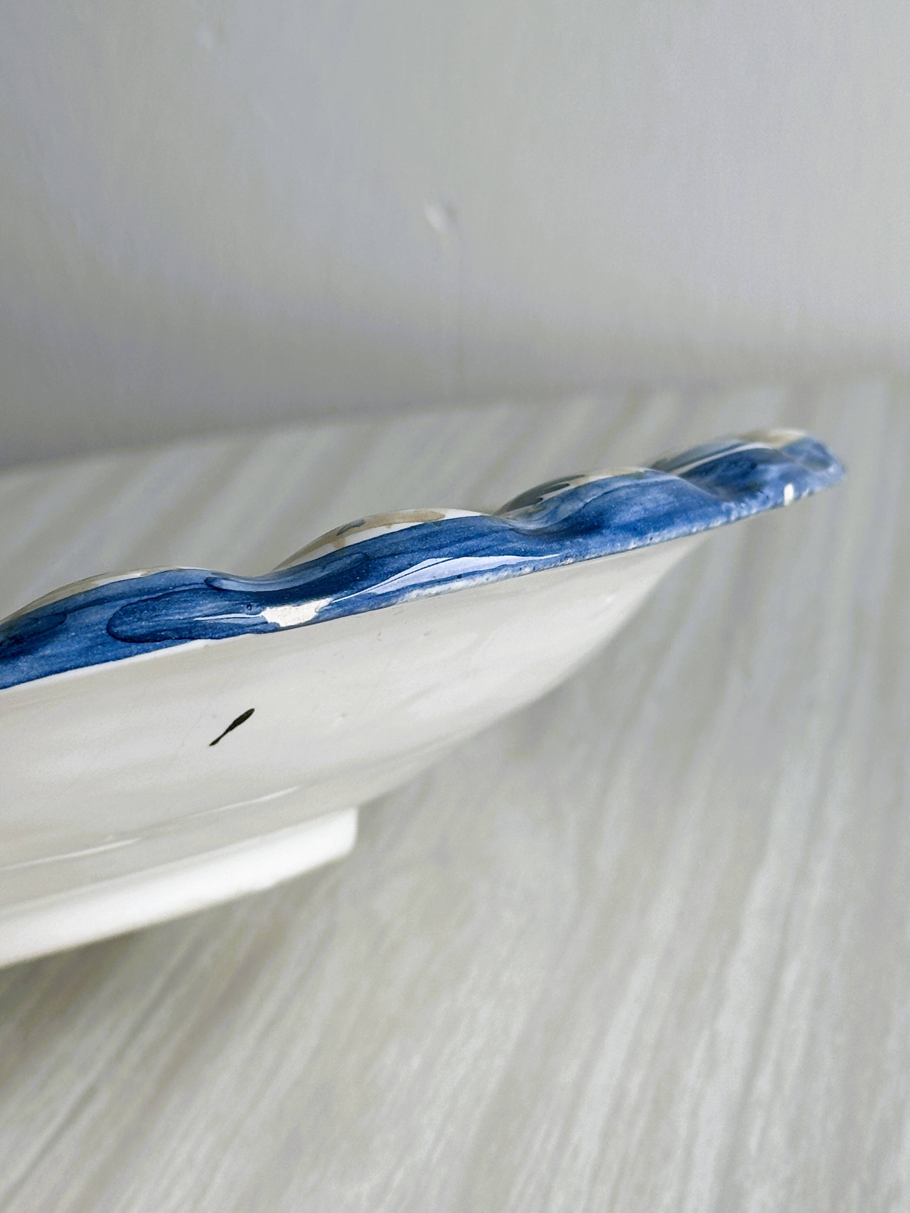 Hand painted decorative dish with floral motifs