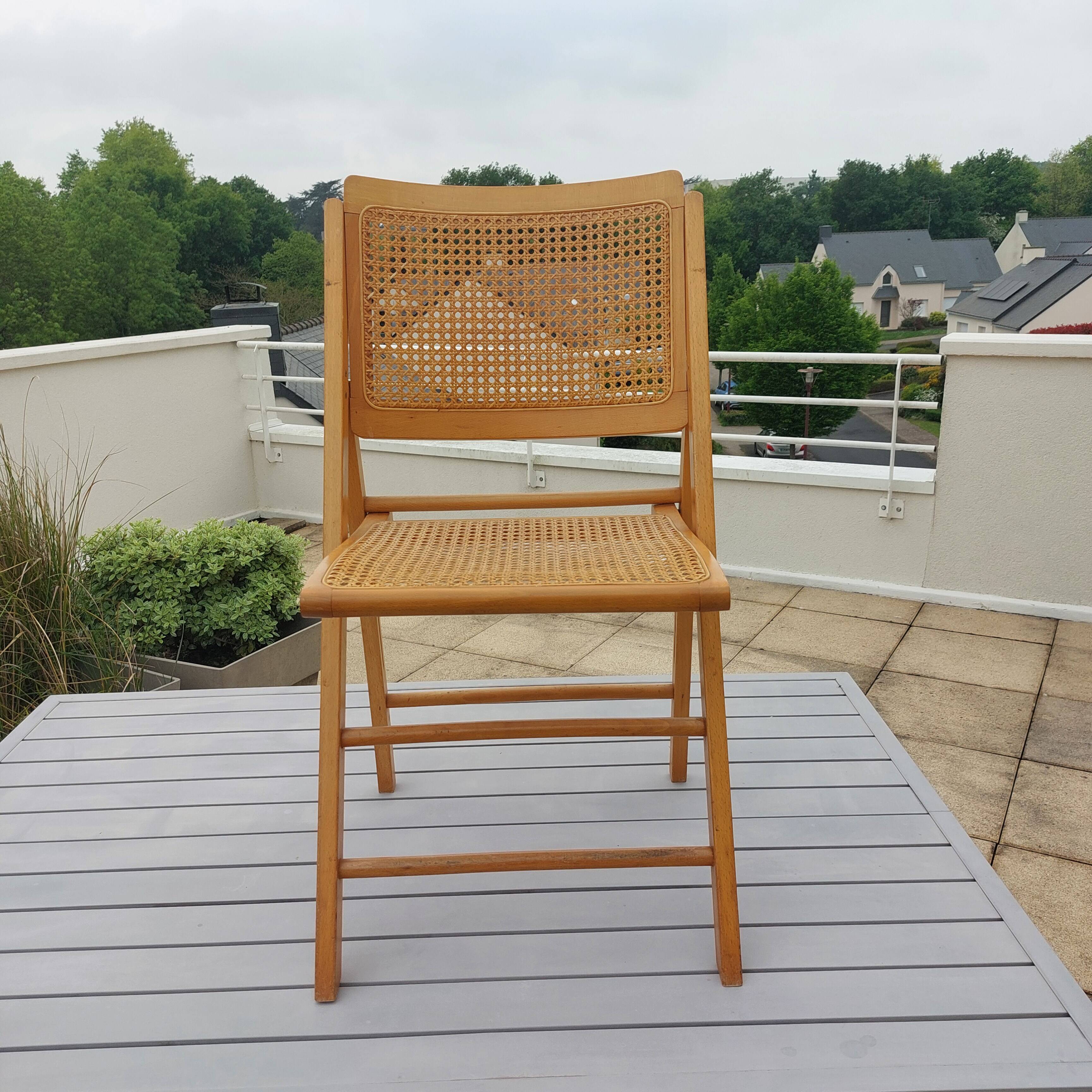 Vintage woven cane folding chair from the 80s