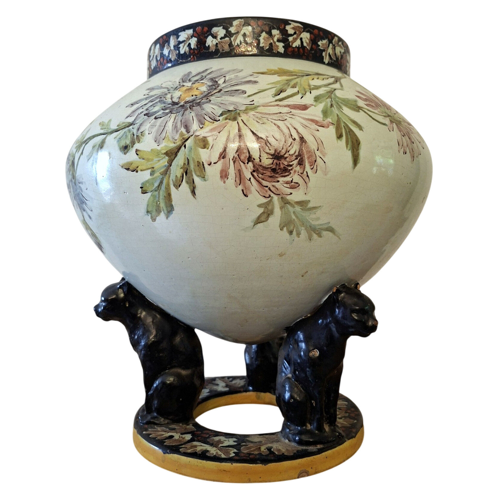 Large polychrome ceramic cache-pot with floral decoration.