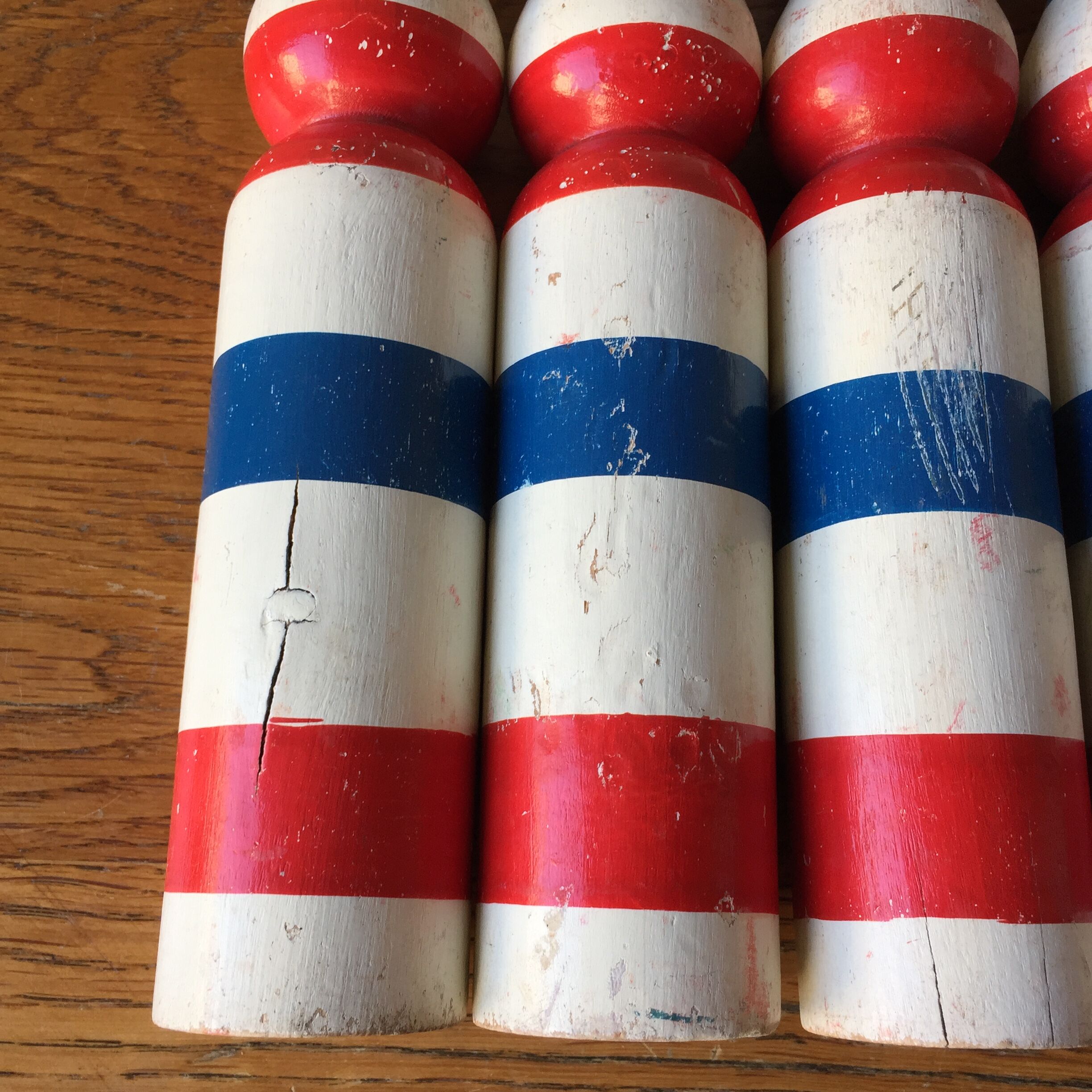 Old vintage wooden bowling game triclore plus two balls
