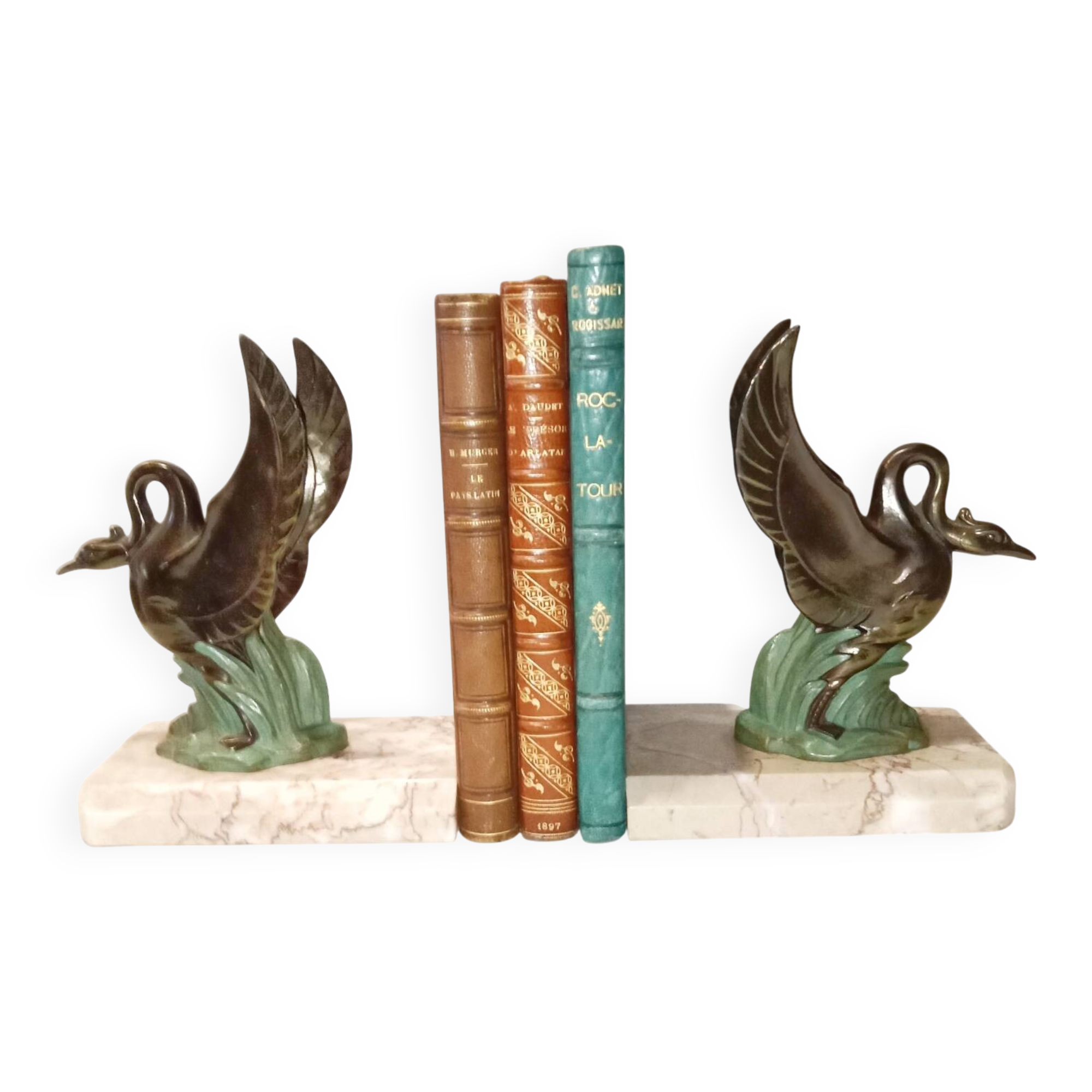 Art Deco bookends with metal swans, double patina and marble base.