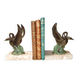 Art Deco bookends with metal swans, double patina and marble base.