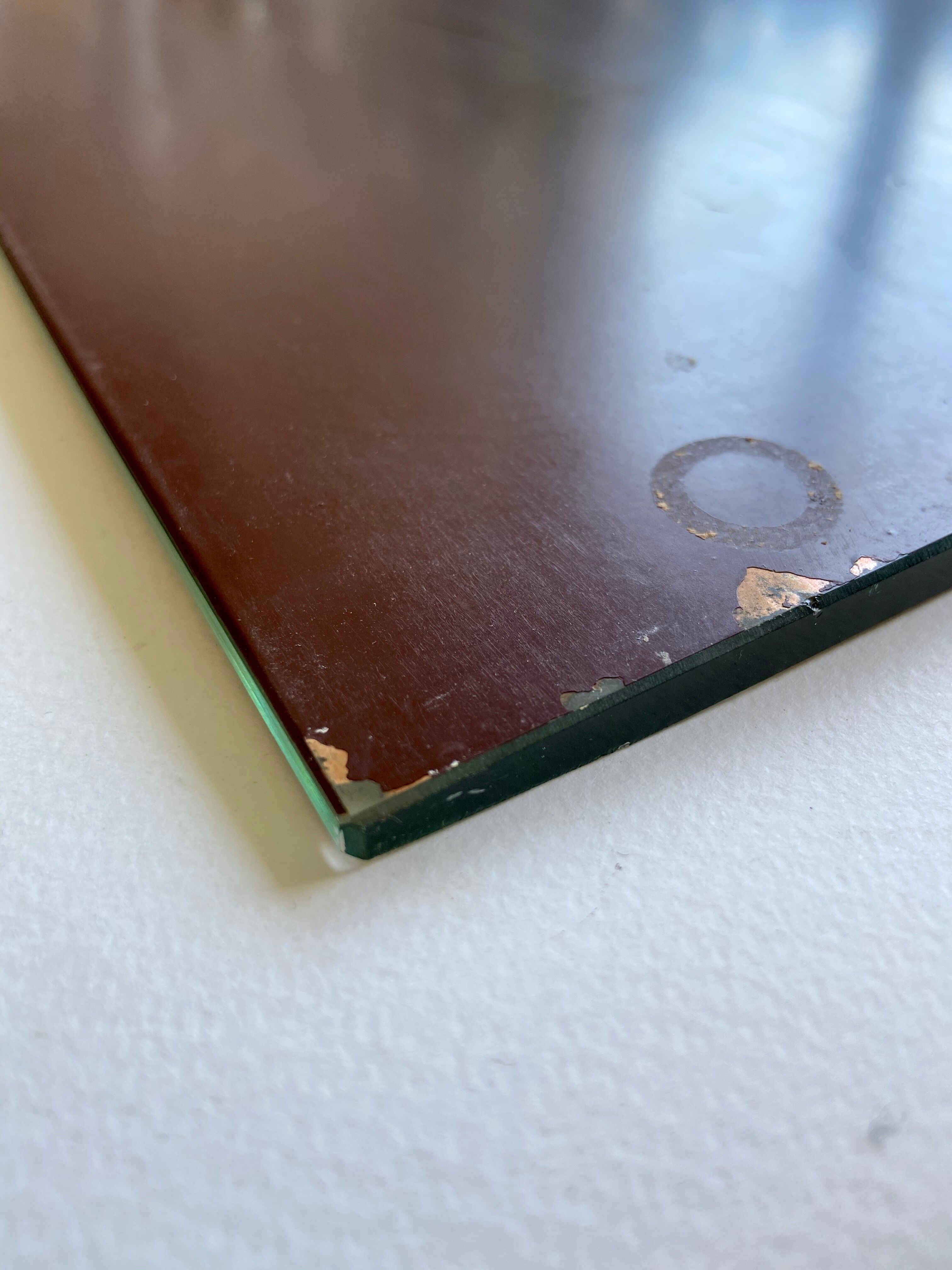 Bevelled mirror 29.5 x 64.5 cm