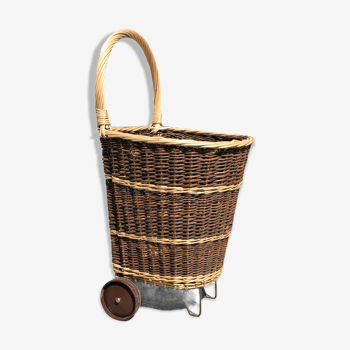 Vintage wicker log basket on wheels