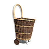 Vintage wicker log basket on wheels