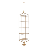 Free-standing shelf in gilded brass with smoked glass shelves. 1970s.