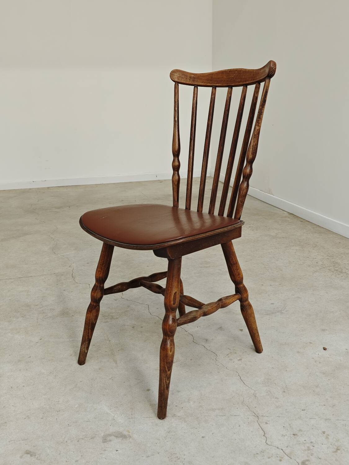Baumann Tacoma bistro chair, wood and brown faux leather, 1960.