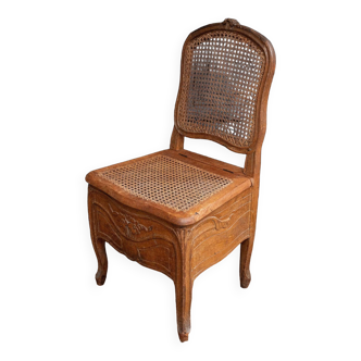 Chair of ease eighteenth carved walnut Louis XV fleurettes