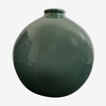 Vase in green bottle