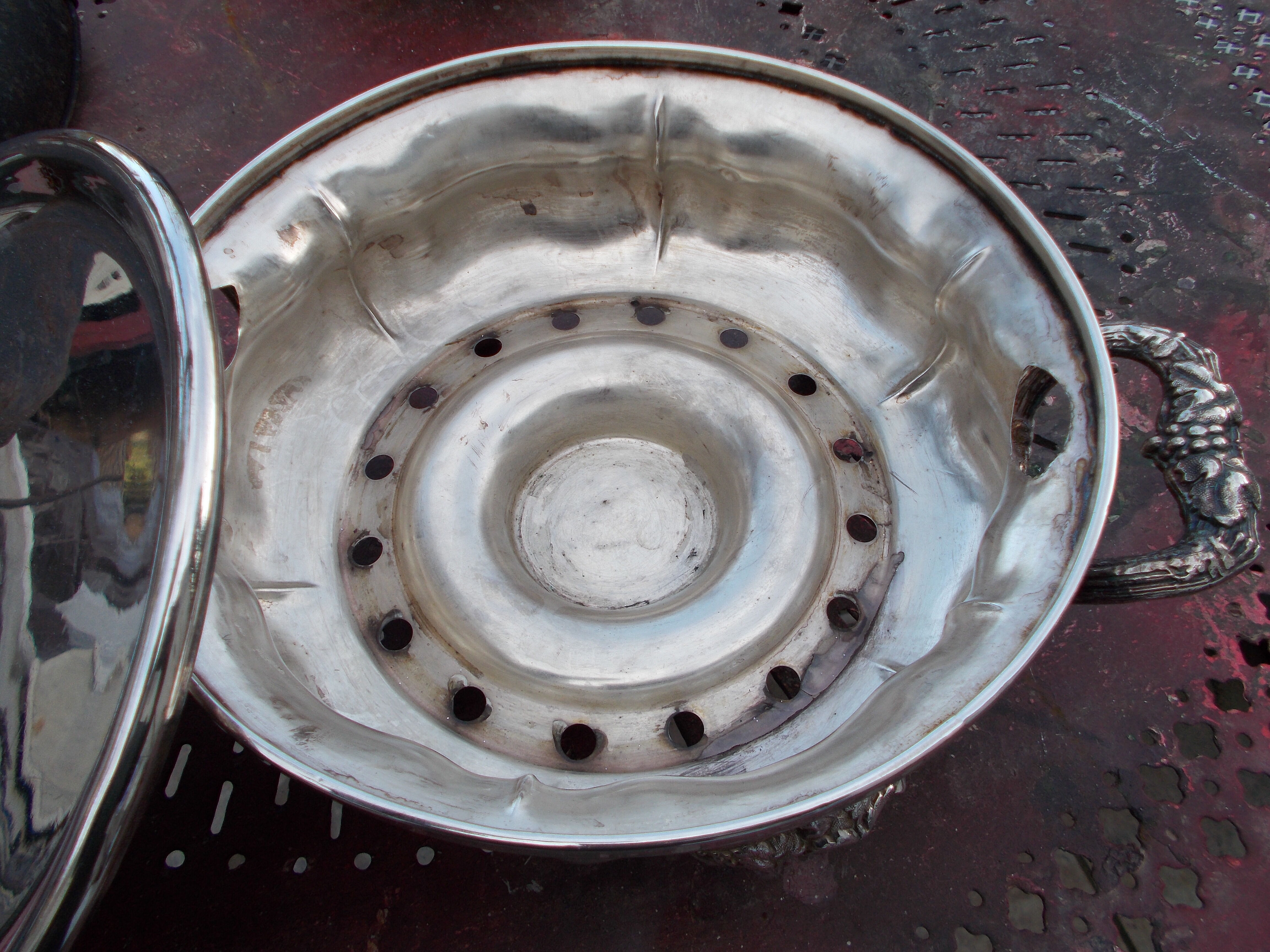 Antique silver-plated metal tealight with vine branch decoration