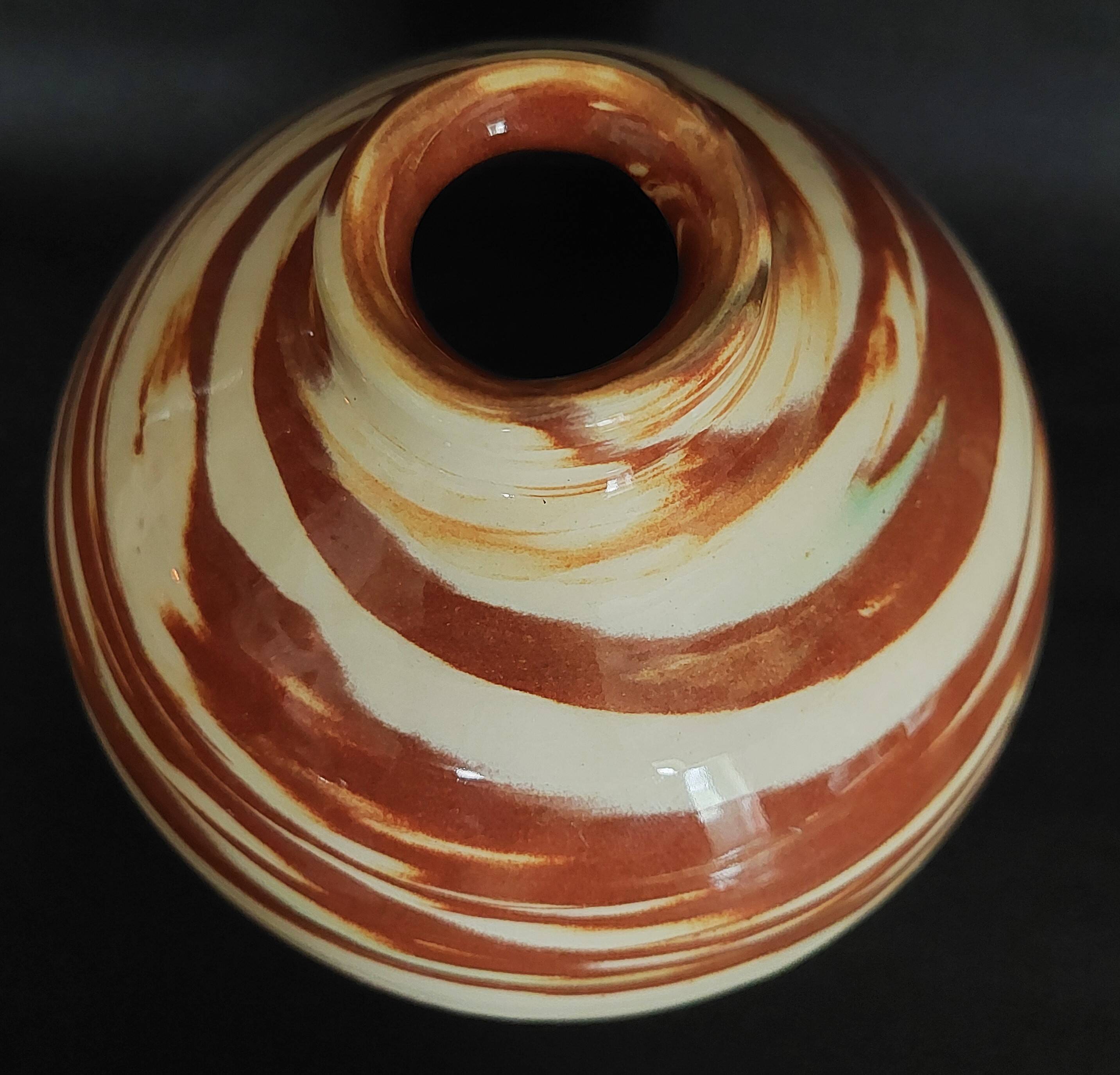 Vintage mixed clay vase