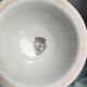 Porcelain carafe with antique decorations