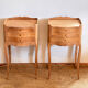 Pair of antique bedside tables / nightstands in raw wood.