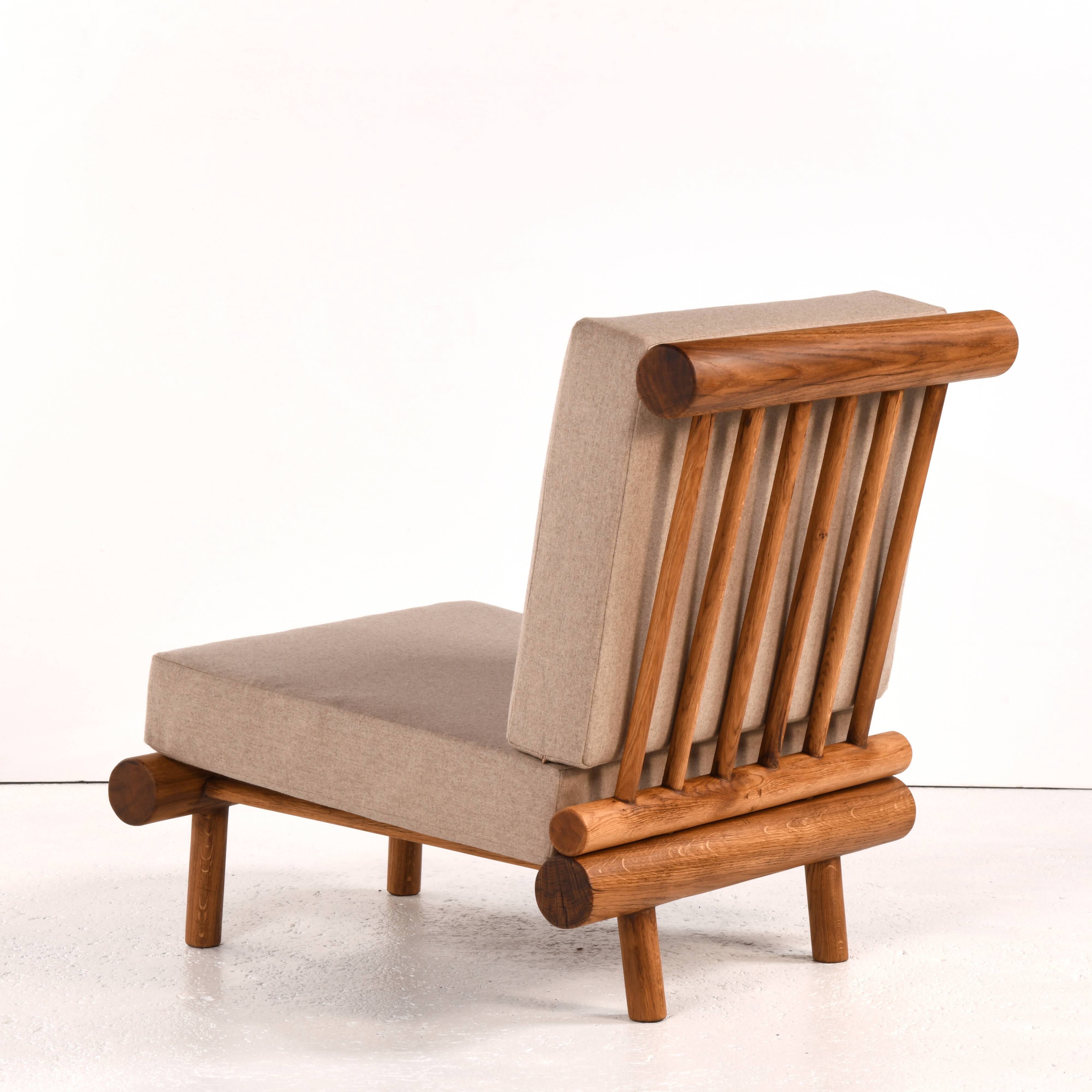 Pair of low chairs called La cachette selected by Charlotte Perriand