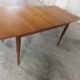Scandinavian teak table with built-in extension