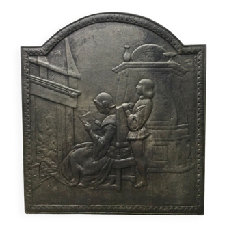 Fireplace plate "reading girl in front of the fire"