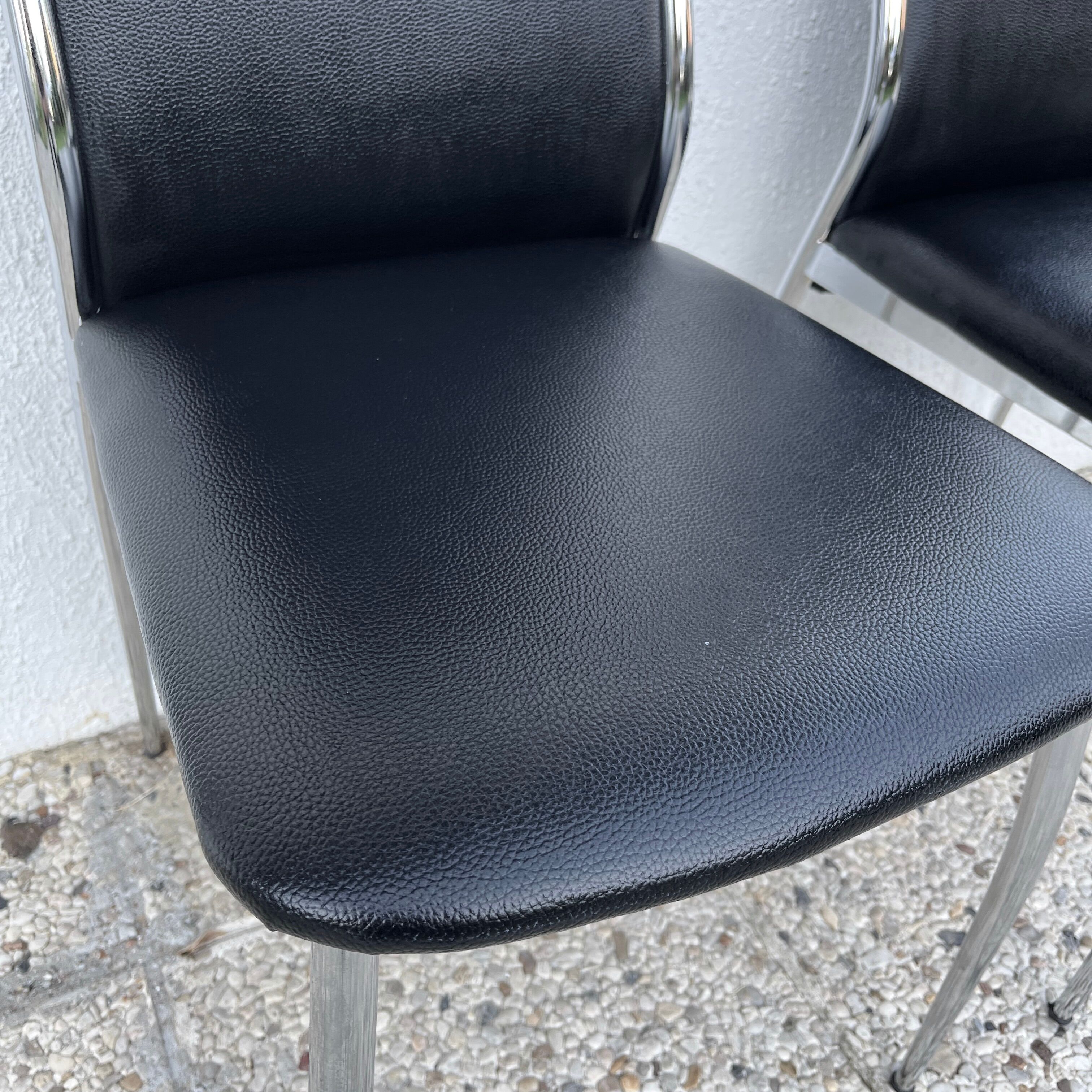 Design chair in black skaï