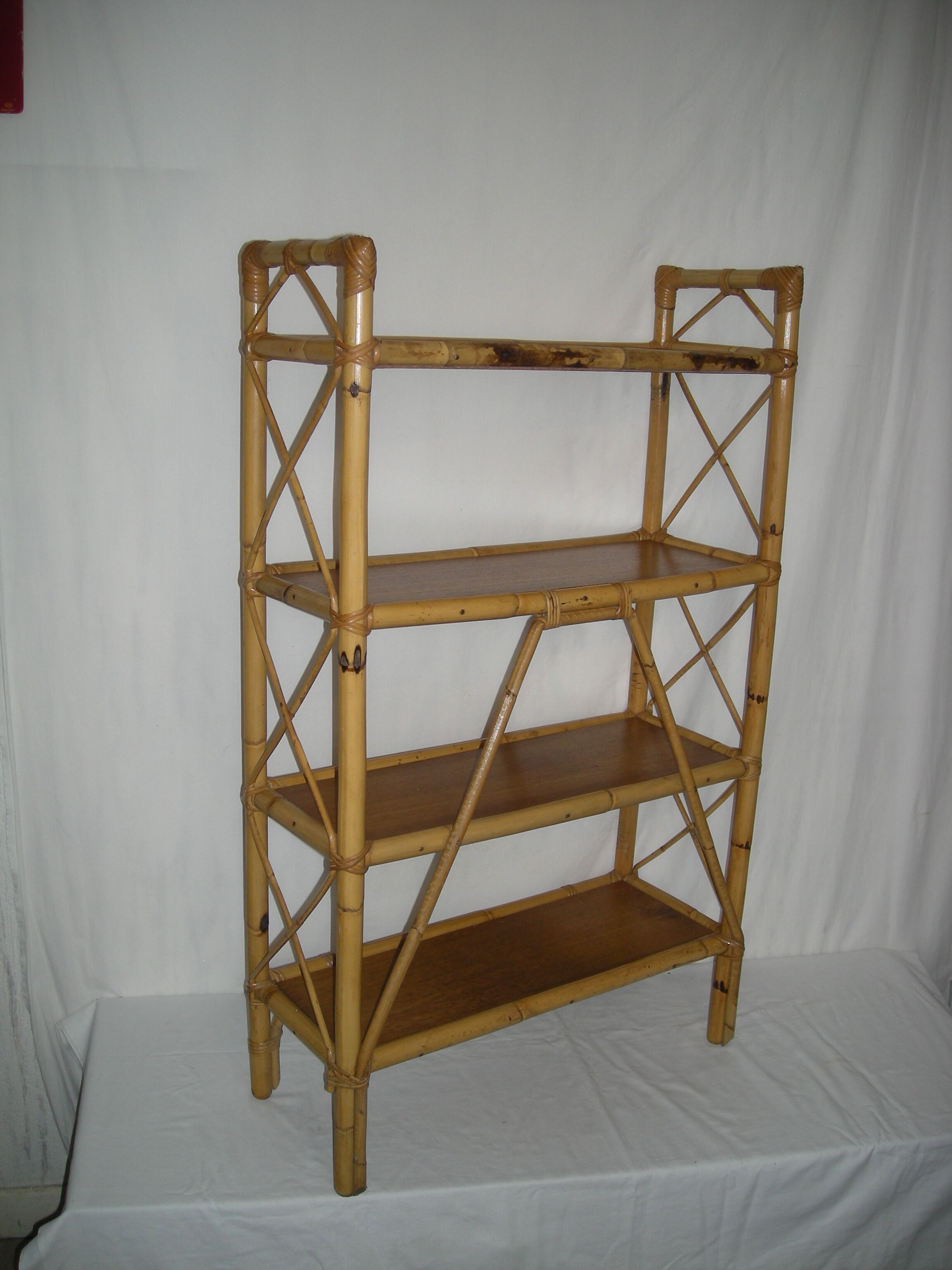 Rattan bamboo shelf on feet from the 50s 60s