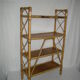 Rattan bamboo shelf on feet from the 50s 60s