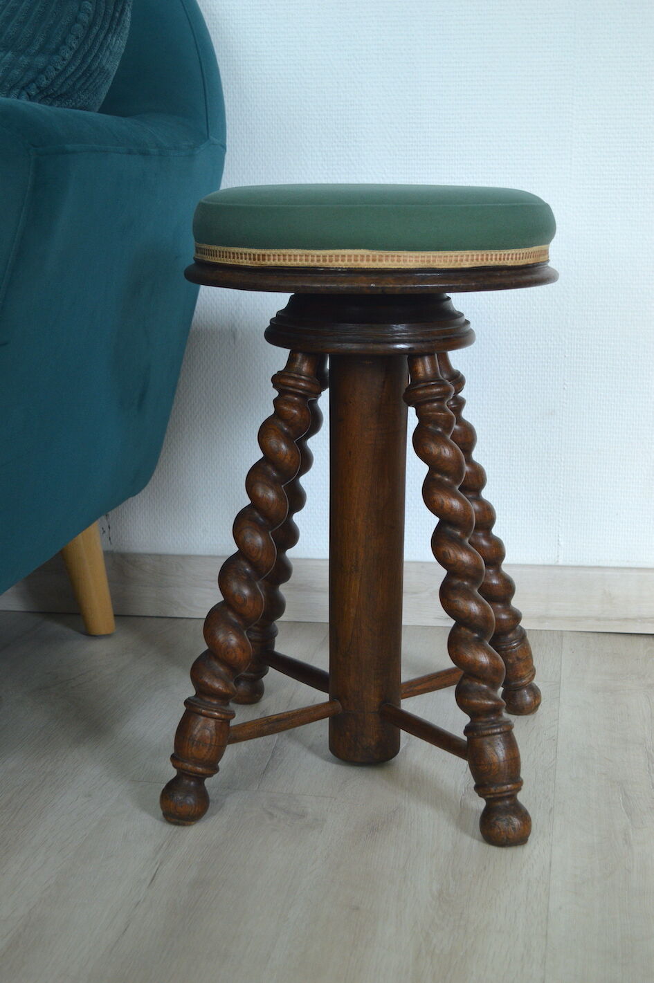 Antique piano stool with adjustable screws and turned wooden legs