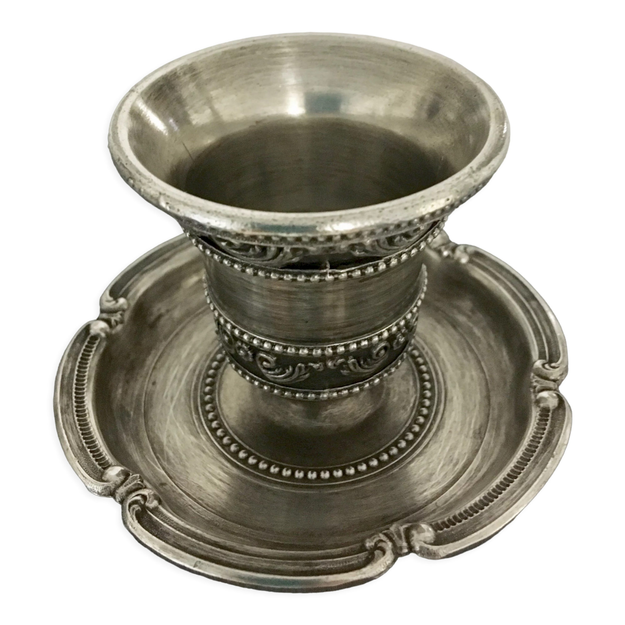 Chiseled silver metal candle holder