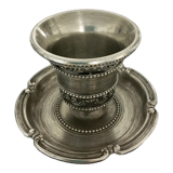 Chiseled silver metal candle holder