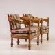 Pair of Giorgetti "1975 Gallery" armchairs in carved wood, original upholstery.