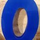 Letter O sign in blue vintage plexiglass