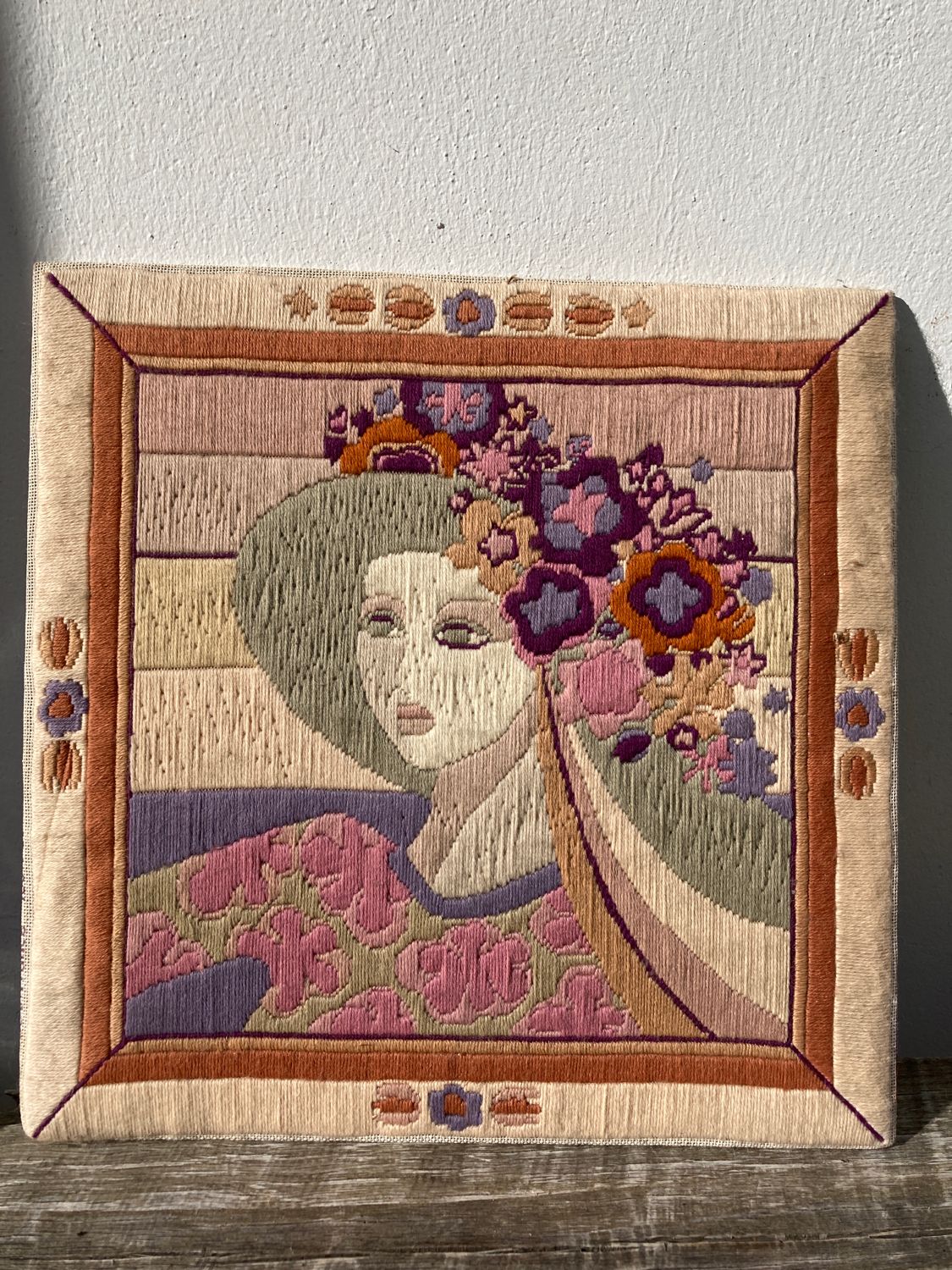 Vintage tapestry portrait of a woman