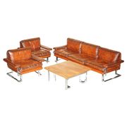 Restored suite Tim Bates for Pieff Mandarin leather chrome hardwood.
