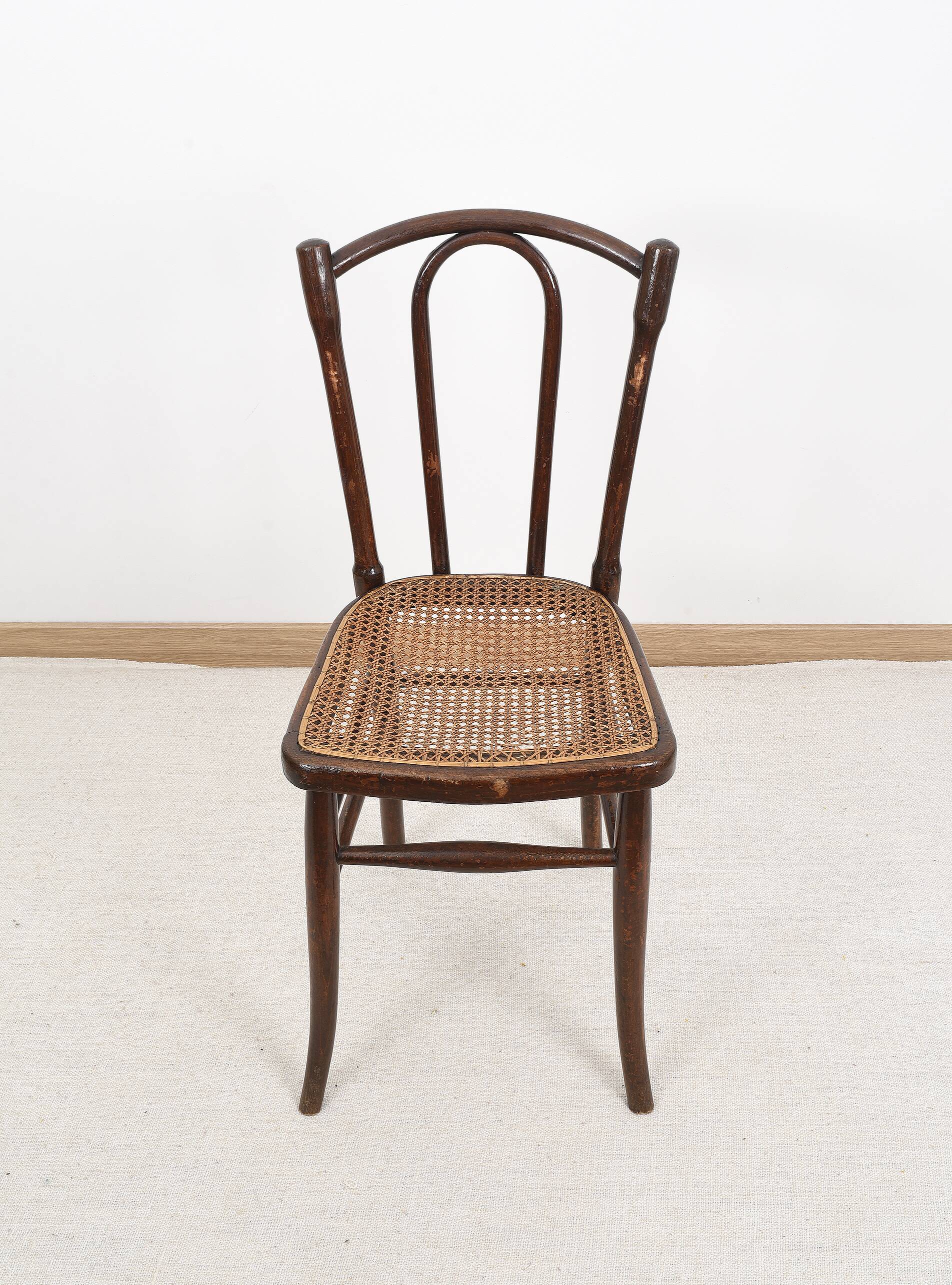 Old cane bistro chair