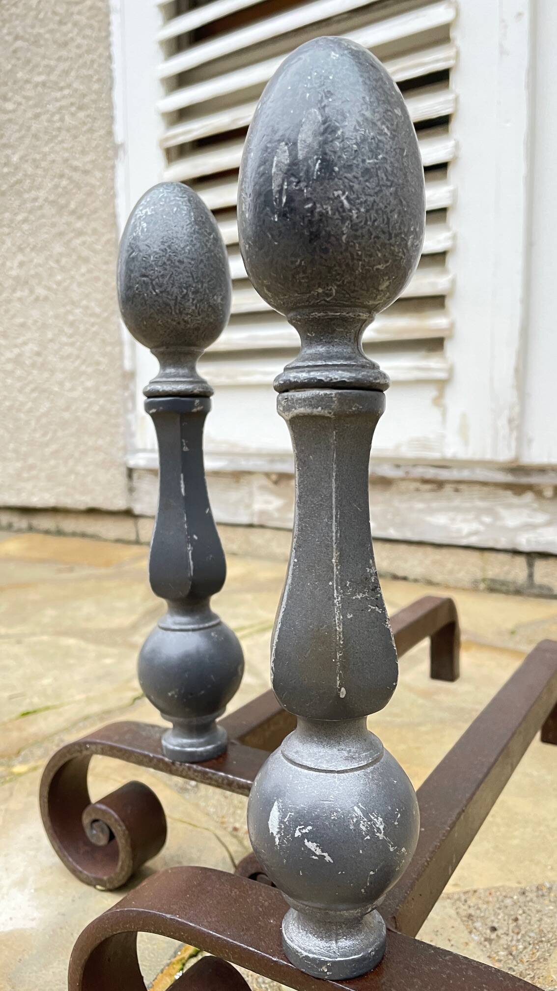 Pair of vintage geometric fire dogs