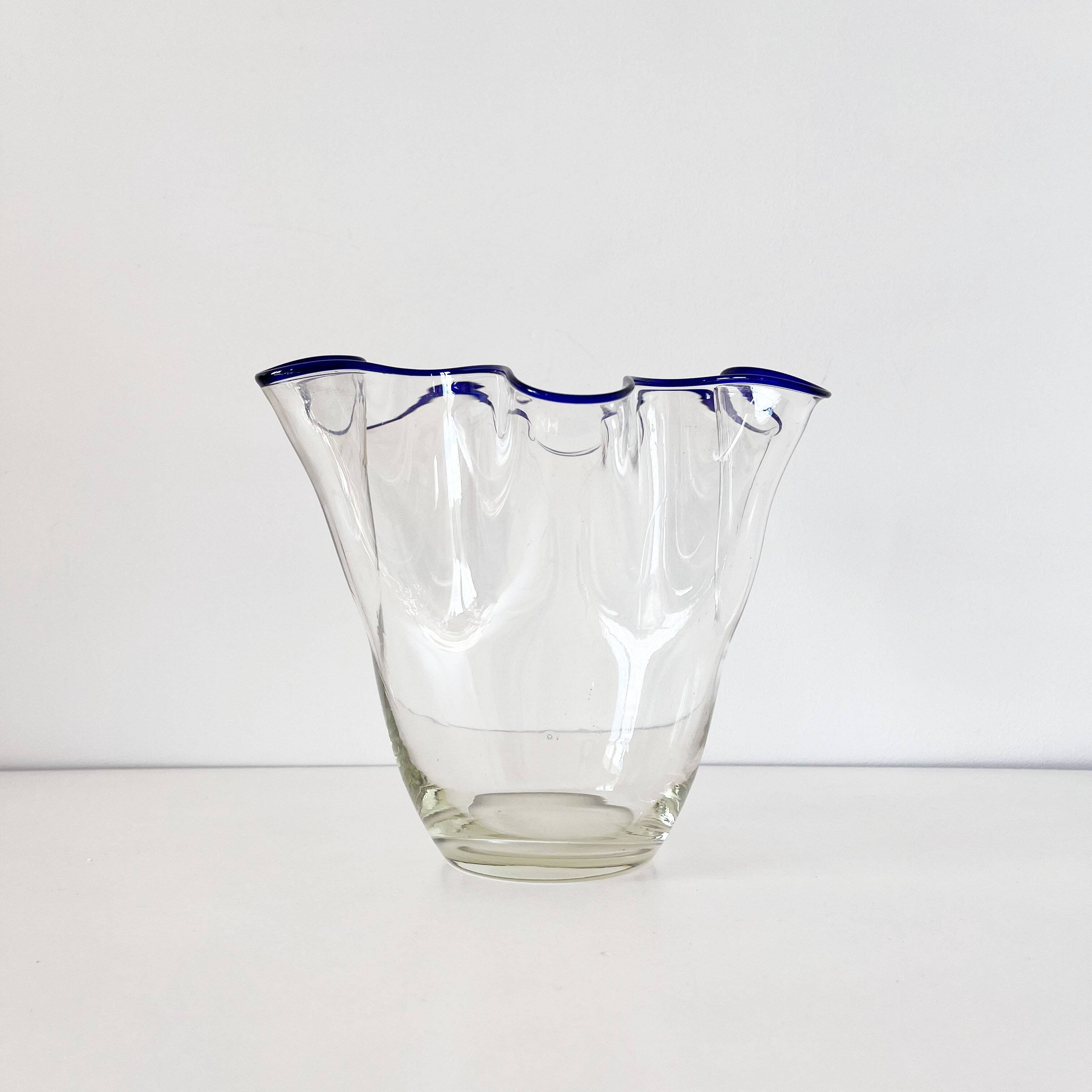 Blue-edged blown glass handkerchief vase