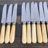 Antique knives with ivory handles.