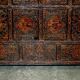 Antique polychrome Tibetan altar cabinet with deer and flowers.