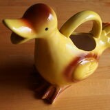 Ceramic watering can in white earthenware, yellow enamel and bird shape