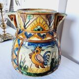 Antique majolica water pitcher made in Italy and hand painted.