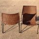 Pair of rattan and steel armchairs